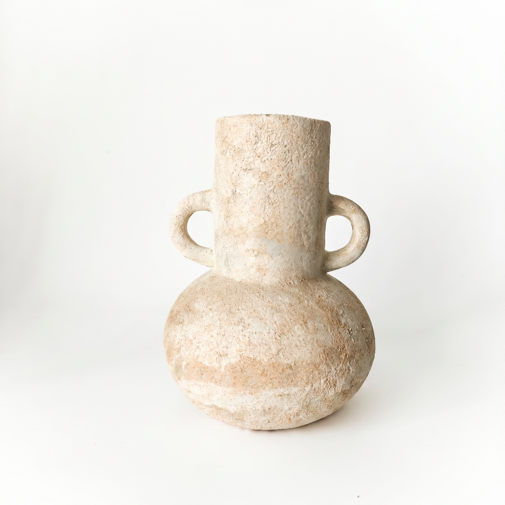 A clear studio shot of a rustic, double-handled ceramic vase by Kove Ceramics on a plain white background, highlighting its earthy tones, round belly, and heavily distressed wabi-sabi texture.